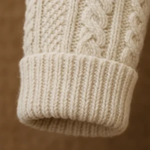 cuff detail of irish cozy knitted sweater
